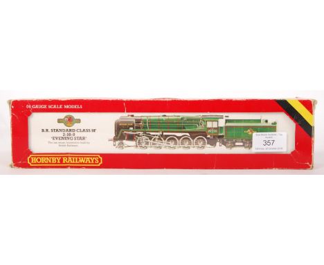 A vintage original Hornby 00 Gauge model railway trainset locomotive and tender: R.065 BR Standard Class 9F 2-10-0 ' Evening 
