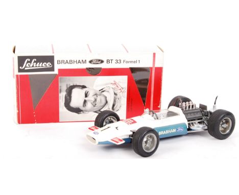 An original vintage Schuco made ' Brabham Ford BT 33 Formel 1 ' ( Formula 1 ) clockwork model racing car. No. 356175. Believe