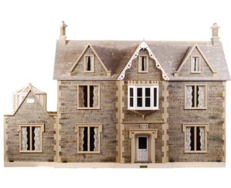 A stunning 20th century Victorian style doll's house ' The Retreat '. A large Victorian style ' mansion house ', with nine ro