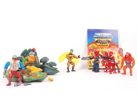 A collection of original vintage 1980's Mattel made He-Man Masters Of The Universe ( MOTU ) action figures and vehicles to in