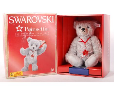 A rare Swarovski limited edition Steiff made teddy bear ' Poinsettia '. 2007 issue. Silver mohair, with glass eyes. Only ever