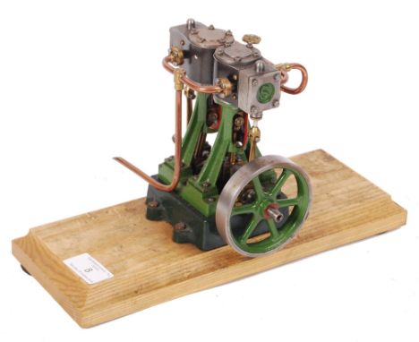 A rare Stuart Turner made twin cylinder vertical engine ' D10 '. Green painted, with brass and copper detailing. Working orde