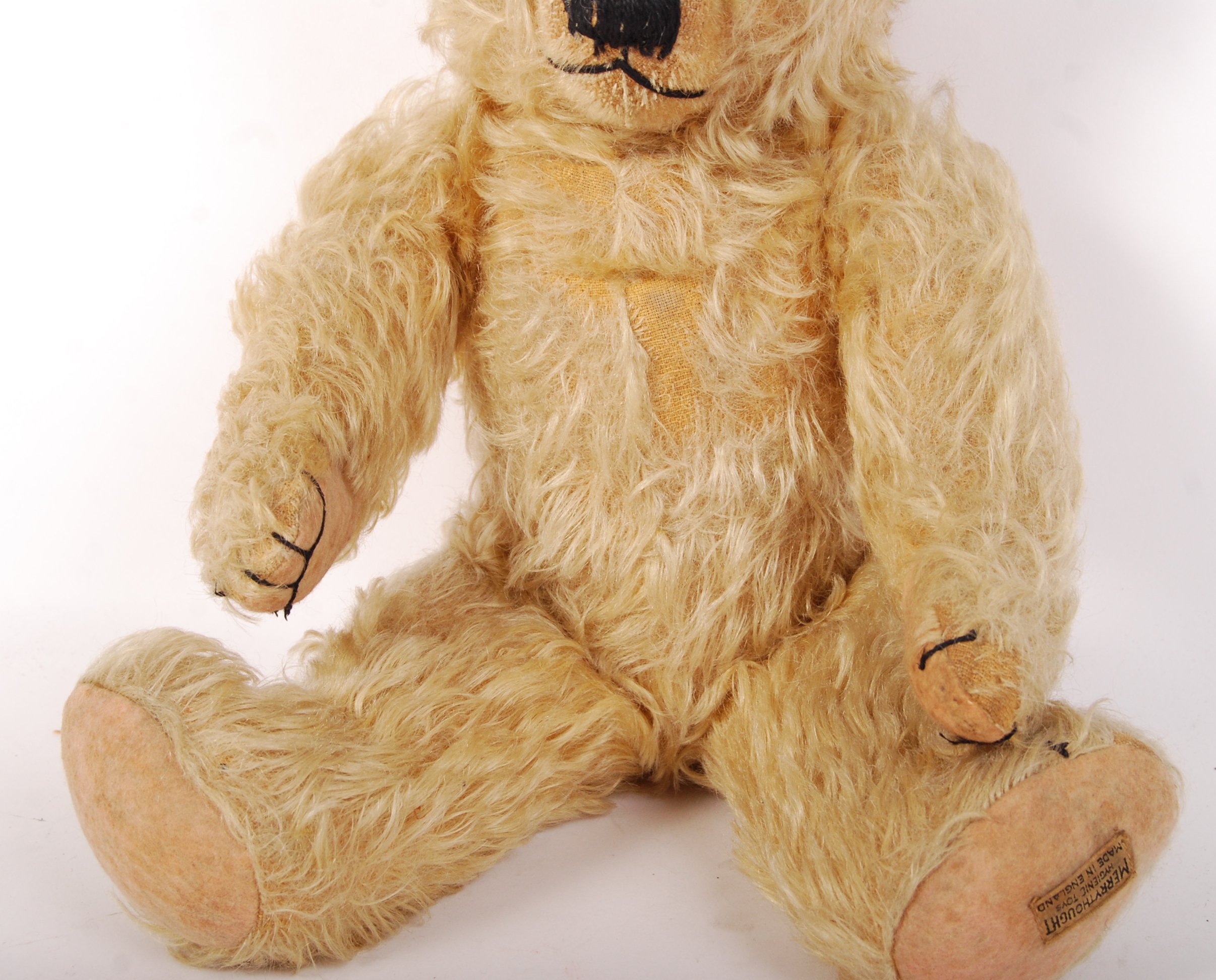 An original vintage 1950's / 1960's Merrythought teddy bear. Golden