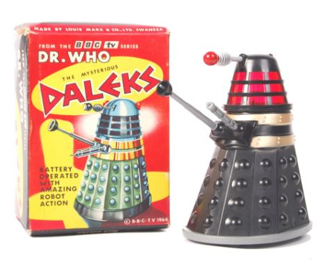 A rare vintage 1960's (1964) Marx Toys made ' Dr Who - The Mysterious Daleks ' battery operated Dalek. Rare gold and black va