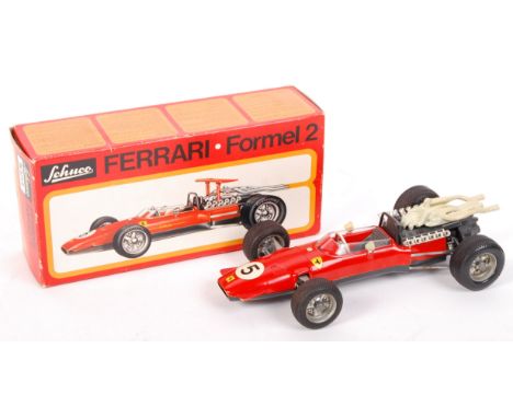 An original vintage Schuco made ' Ferrari Formel 2 ' ( Formula 2 ) clockwork model racing car. No. 1073 . Believed ex-shop st