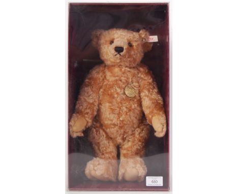 A Limited Edition Steiff teddy bear - ' Winston '. Brown mohair, with glass eyes and Hamleys medal. Only ever displayed, ear 