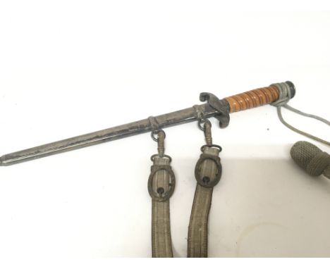 A fine example of a Genuine German Third Reich II world war officers presentation dagger maker Carl Erickhorn with engraved S