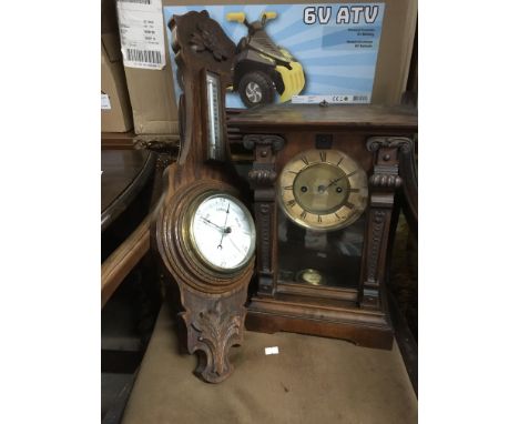 A mahogany cased clock with an eight day movement together with an oak cased barometer (2).
