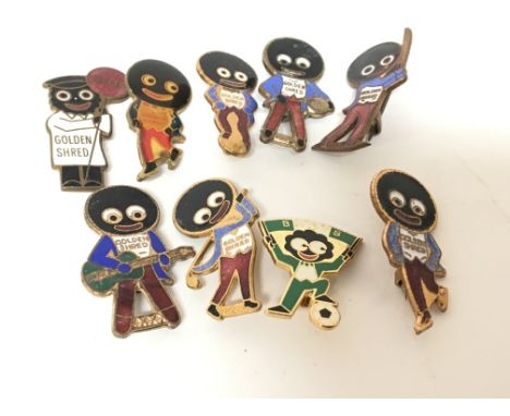 A small collection of nine vintage Robinsons enamel golly badges.
