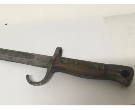 A First World War British bayonet with makers mark and crown of George V marks no scabbard.