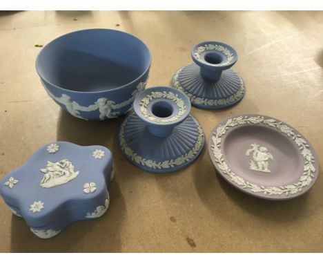 Five items Wedgwood Jasper ware including candlestick holders, trinket box, bowl and dish