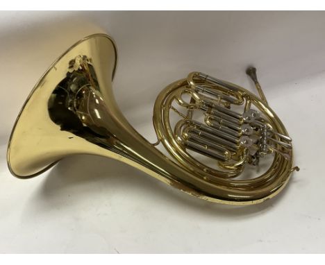 A cased Anborg French Horn.