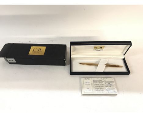 A cased Caran DAche gold pen model number 0872.782. Comes with its certificate of insurance from when first purchased.
