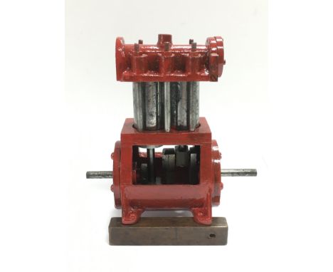 A small antique marine engine, approx height 18.5cm.