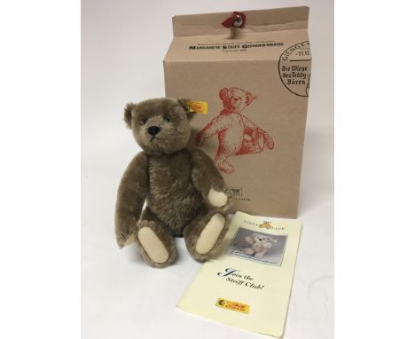 A Steiff bear in original box.