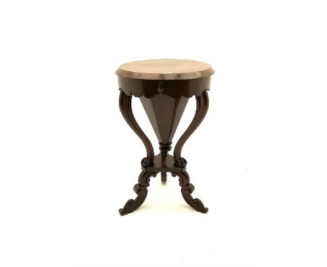 Victorian rosewood work table, circular hinged lid enclosing trumpet shaped body with fitted interior, scroll carved serpenti