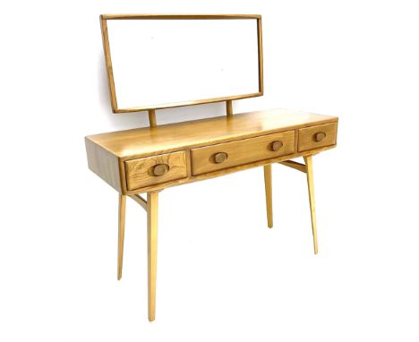 Ercol dressing table with raised mirror back, rectangular top raised with two short and one long drawer, raised on tapering s