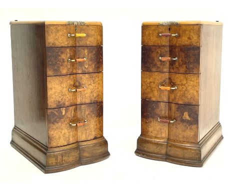 Pair Art Deco period figured walnut pedestal bedside lamp chests, shaped form with double bow front, each fitted with four gr