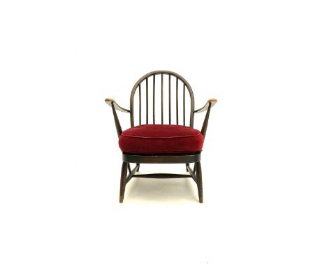 Ercol hoop back low armchair, with upholstered seat, turned supports joined with �H� stretcher Dimensions: Length/Width:&nbsp