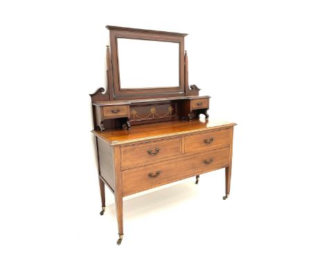 Edwardian inlaid mahogany dressing chest, raised bevelled rectangular mirror above small trinket drawers, the chest fitted wi