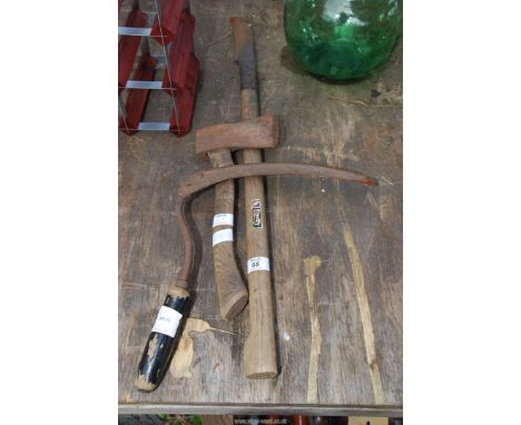 A small axe, scythe and hedge bill.