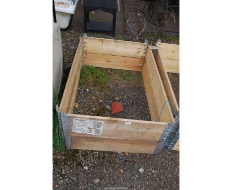 A raised bed frame, 47" x 31" x 15 1/2" high.