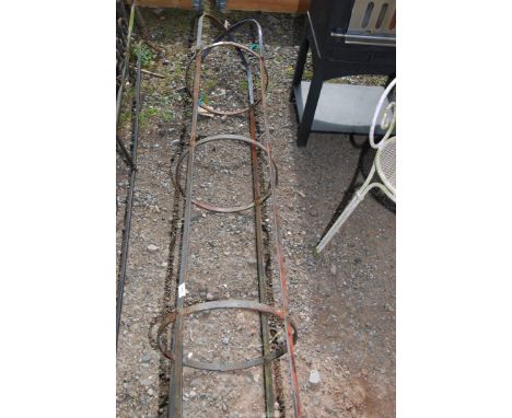 A wrought iron obelisk.