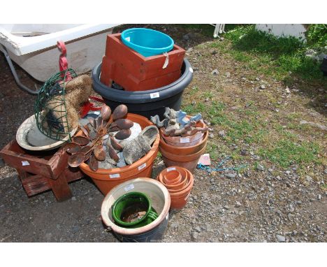 A large quantity of garden pots, ornaments, etc.