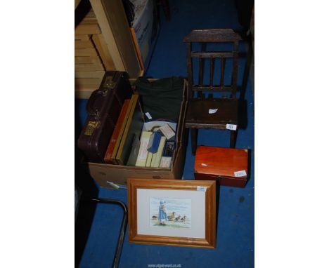 A box of miscellaneous to include: a briefcase, pictures, dolls chair, gardening apron, etc.