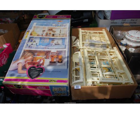 A boxed Pedigree 1980's three level "Sindy" House.