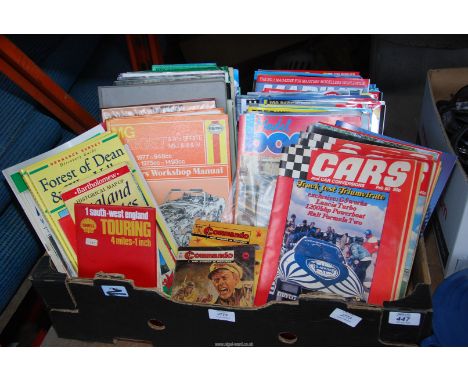 A box of car magazines, Haynes manuals, maps, etc.