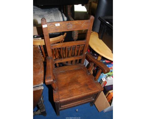 A commode chair.