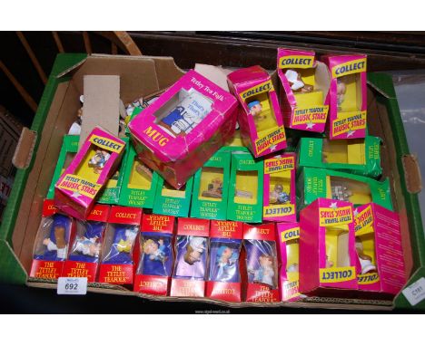 A box of Tetley Tea collectables.