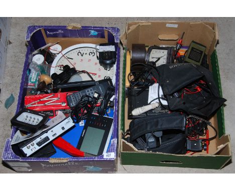 Two boxes of miscellaneous including remotes, clocks, camcorder, etc.