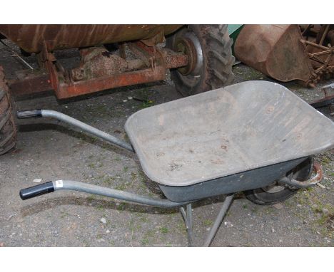A galvanised wheelbarrow on a pneumatic tyre.