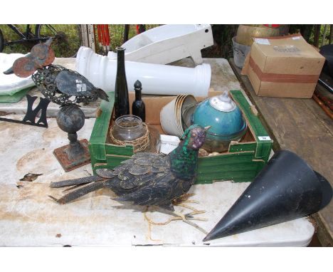 A box of miscellaneous, glass bowls, metal garden ornaments, etc.