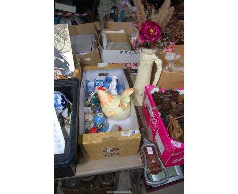 A box of miscellaneous china and a shooting stick.