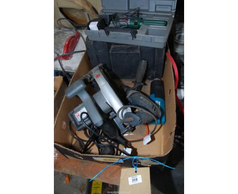 A box of power tools including Bosch screwdriver, circular saw, drill, etc.