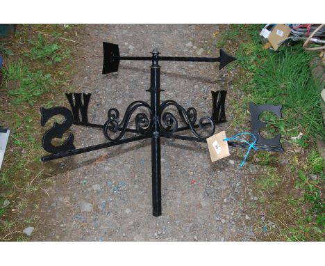 A Wrought Iron weather vane.