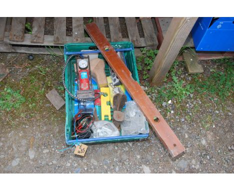 A box of miscellaneous, foot pump, shoe lasts, levels, etc.