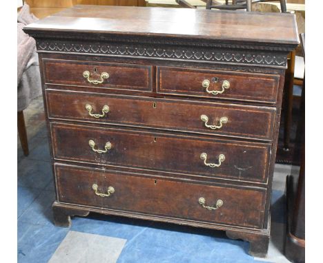 A 19th Century Oak Chest with Crossbanded Top, Blind Carved Top Rail and Two Short and Three Long Drawers with Crossbanding a