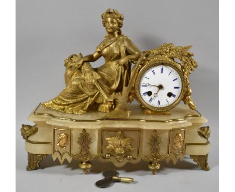 A French Ormolu and Alabaster Figural Mantle Clock on an Agricultural Theme with Seated Maiden with Sheath of Corn Resting on