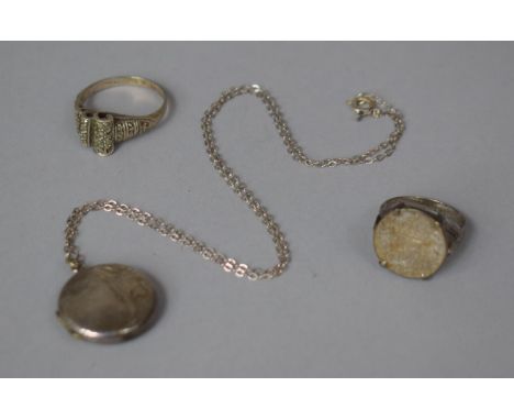 A Continental Silver Ring, Silver Threepenny Bit and a Silver Locket 