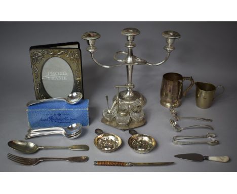 A Collection of Various Metalwares to include Three Branch Candelabra, Soup Spoons, Silver Plated Four Piece Cruet, Six Spoon