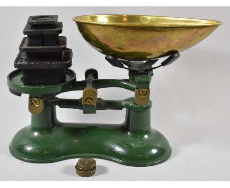 A Set of Green Enamelled Scales with Brass Pans and Various Weights 