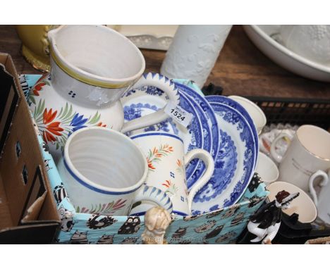 A Quimper jug a/f, two mugs and five Cauldron blue and white plates.