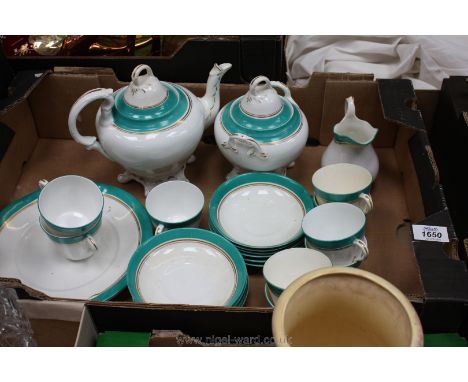 A green/white twenty-six piece tea service, unmarked, circa 1820 including teapot with lid, sugar bowl with lid, milk jug, ni