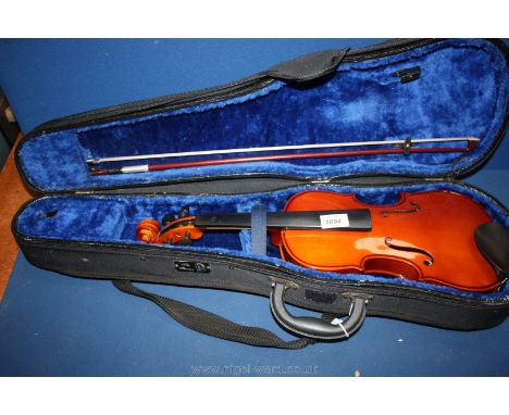 A 20th c. Stentor Violin in fitted canvas carrying case, complete with bow.