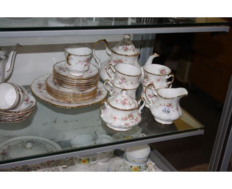 A Paragon 'Victorian Rose' Teaset consisting of six cups and saucers, teapot, etc.