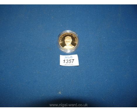 A plastic encased yellow metal commemorative Medallion ''John Dickenson"" 1782-1869 dated 1990 to the reverse and having a go